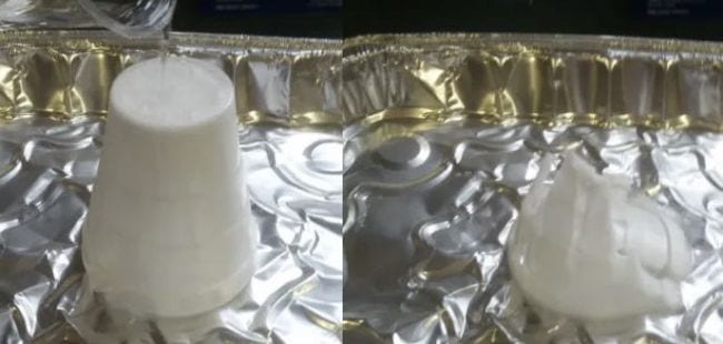 Styrofoam cups in a tin of liquid, one half dissolved